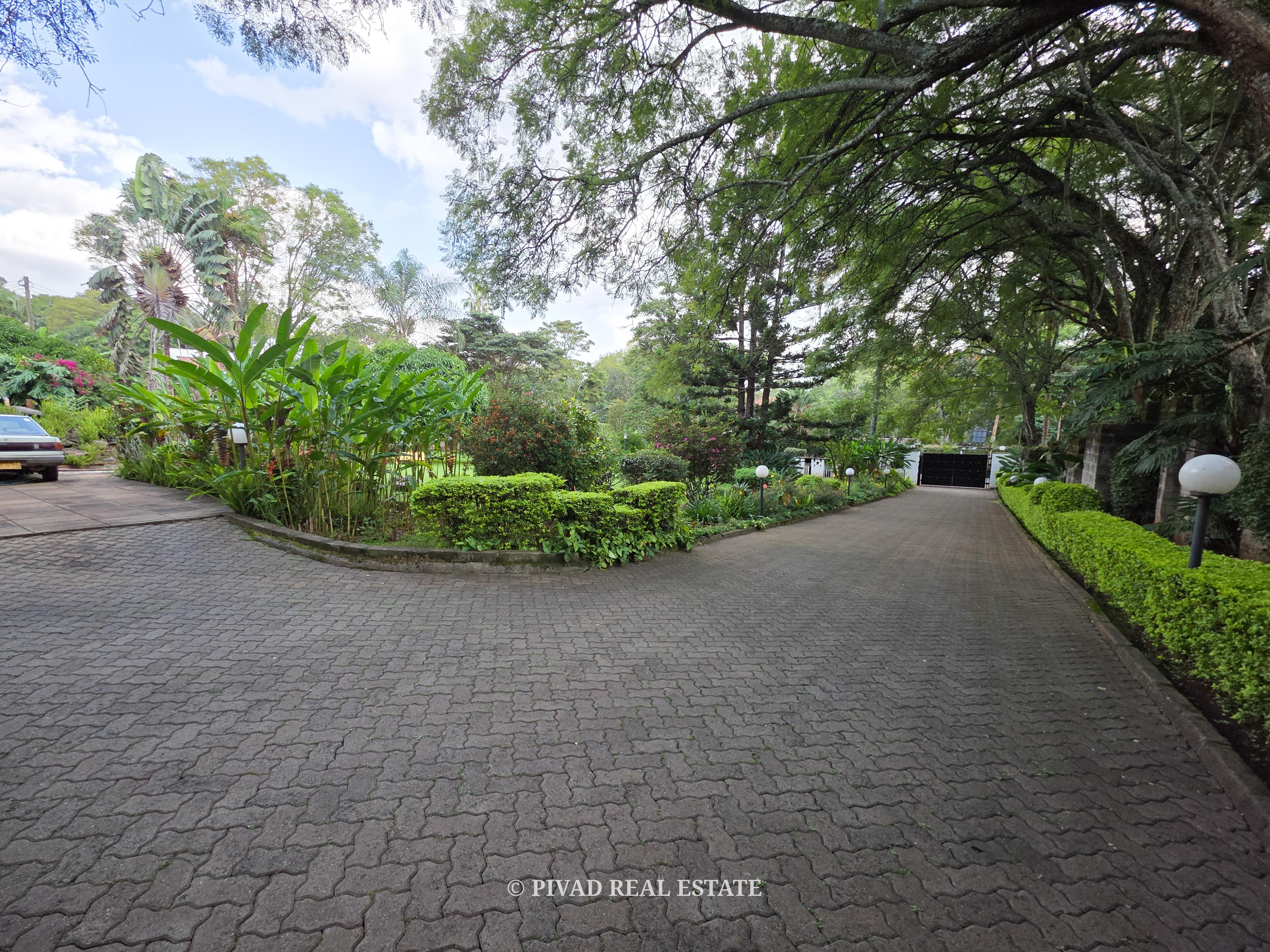 Expansive 1-Acre Freehold Land With an old house Available for Sale in Thigiri Estate